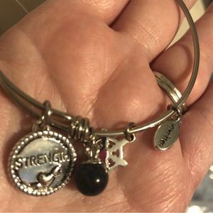 Unwritten Silver (sterling) strength bangle bracelet 
From Macy’s